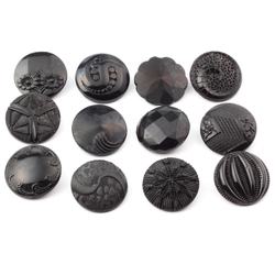 Lot (12) vintage Czech Art Deco geometric and floral black glass buttons 23mm