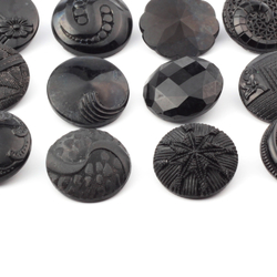 Lot (12) vintage Czech Art Deco geometric and floral black glass buttons 23mm