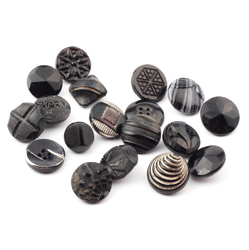 Lot (16) vintage Czech Art Deco geometric and floral black glass buttons