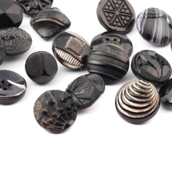 Lot (16) vintage Czech Art Deco geometric and floral black glass buttons