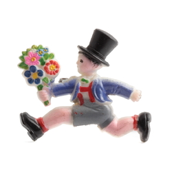 Art Deco celluloid pin brooch; running Top hat boy with flower bunch hand painted blue grey