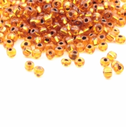 Lot (300) 3mm vintage Czech gold lined topaz seed glass beads