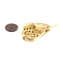 Vintage Czech gold tone plated rhinestone leaf brooch signed