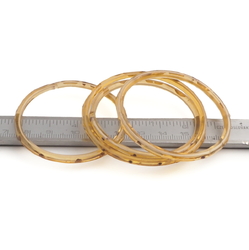 Lot (4) antique Czech white striped topaz yellow bicolor glass bangles with gold gilt 