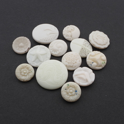 Lot (13) Vintage Czech white uranium geometric flower glass buttons