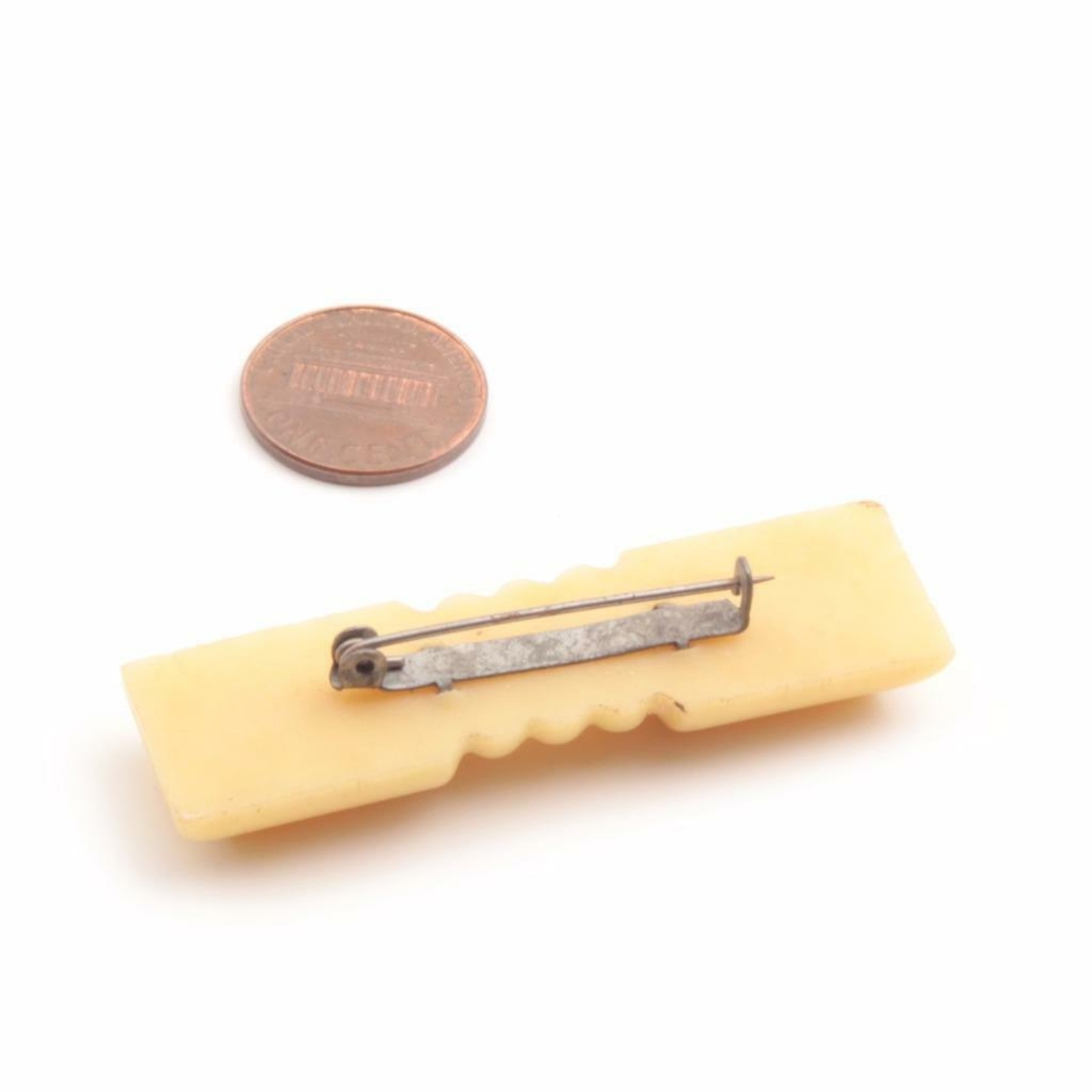 German Art Deco galalith yellow plastic carved geometric ribbed pin brooch
