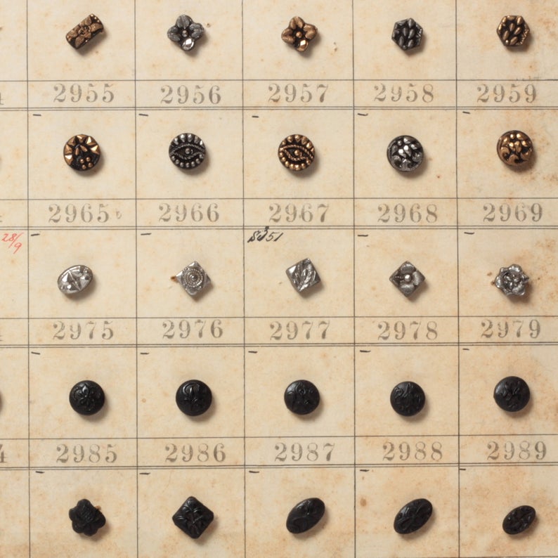 1904 Sample card (150) Czech antique black floral and geometric dimi glass buttons