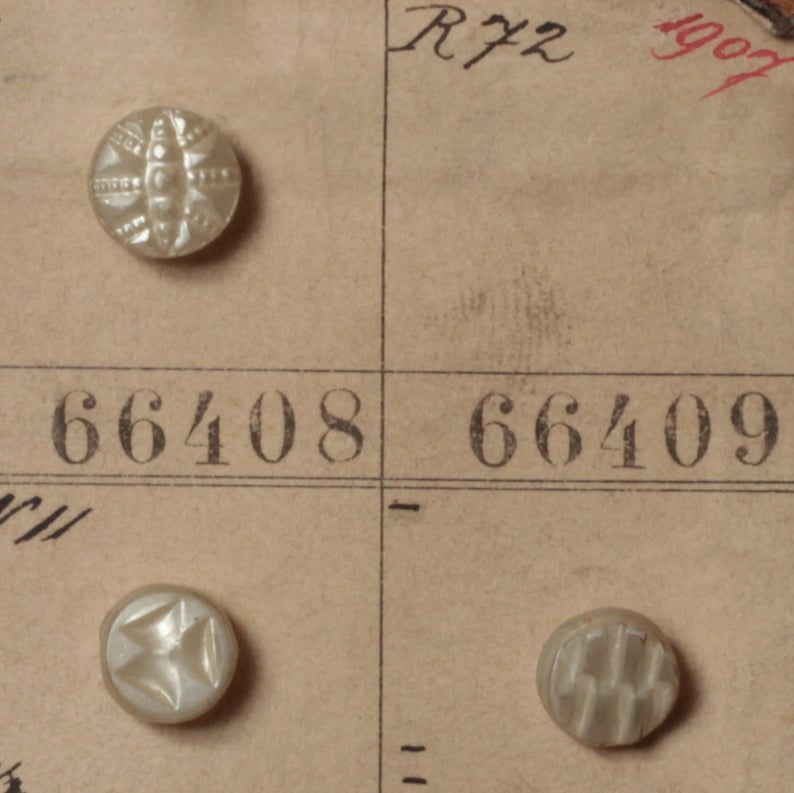 1907 Sample card (149) Czech antique pearl and pewter lustre dimi glass buttons