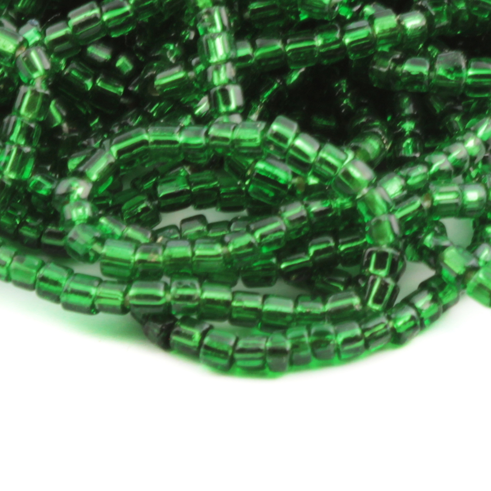 Hank (4500) Vintage Czech silver lined green bugle seed beads 16 beads per inch