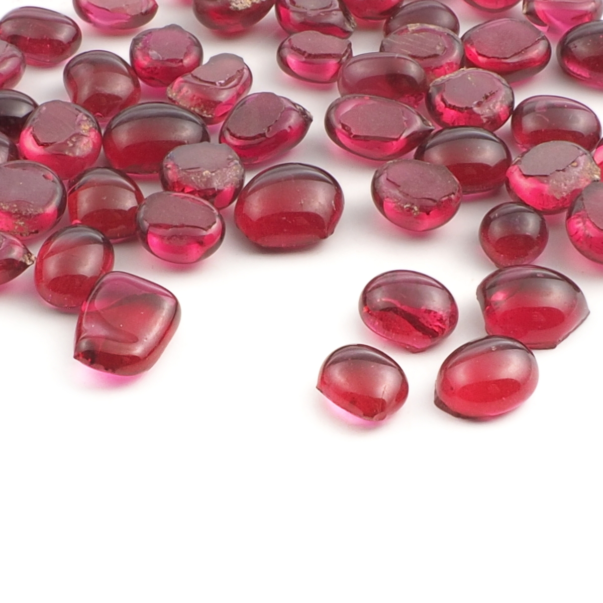 Lot (62) 19th century Czech antique cranberry pink glass cabochon drops