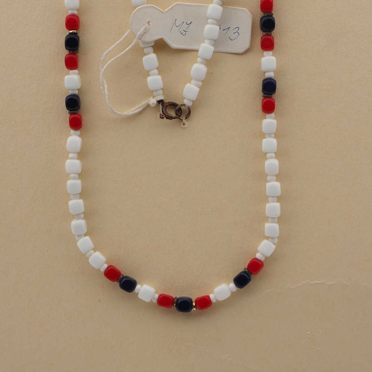 White, Red and Green Bead Necklace and Stone Studded Metal Pendant with  Earrings