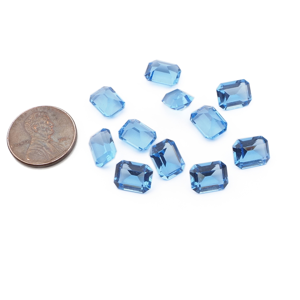 Lot (12) Czech vintage sapphire blue octagon glass rhinestones 9x7mm