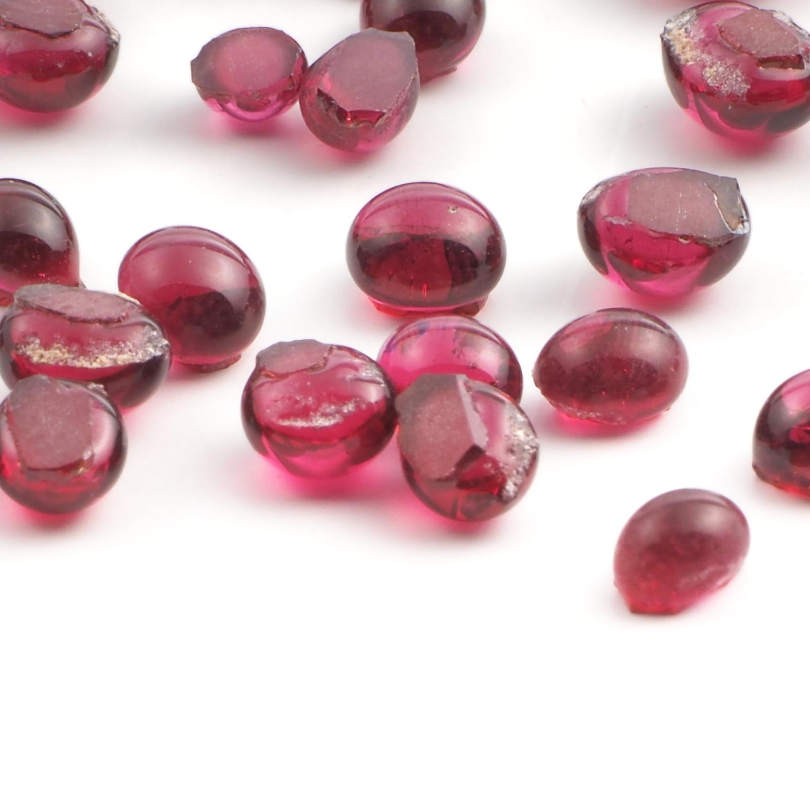 Lot (37) 19th century Czech antique cranberry pink glass cabochon drops 3-5mm