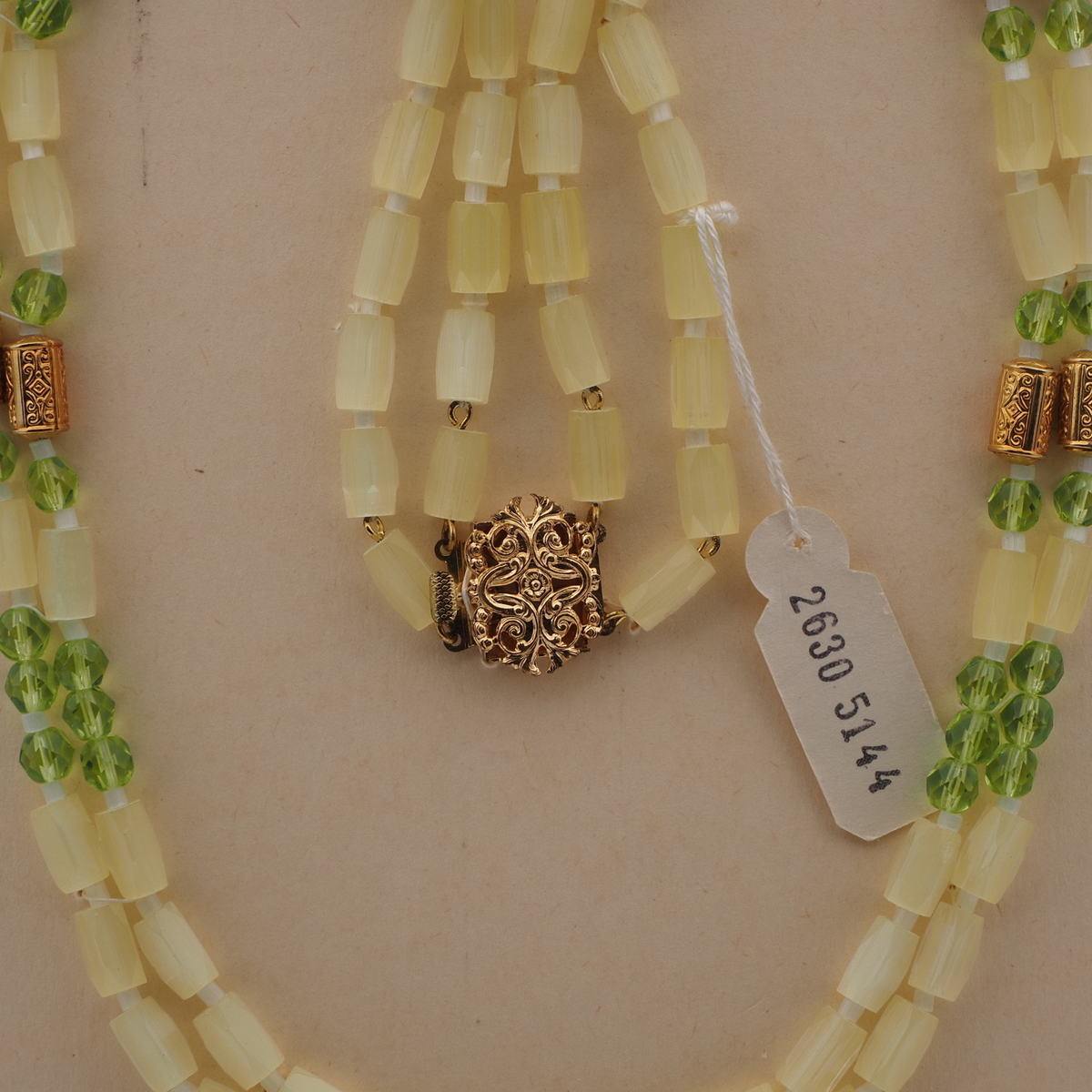 Vintage Czech 2 strand necklace yellow satin atlas green glass beads 