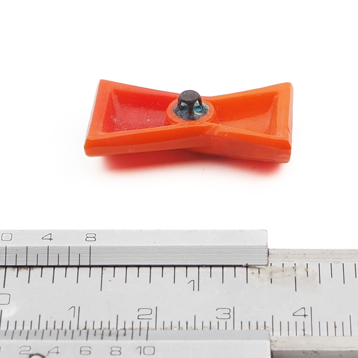 Vintage Czech Deco geometric orange bow glass button 29mm