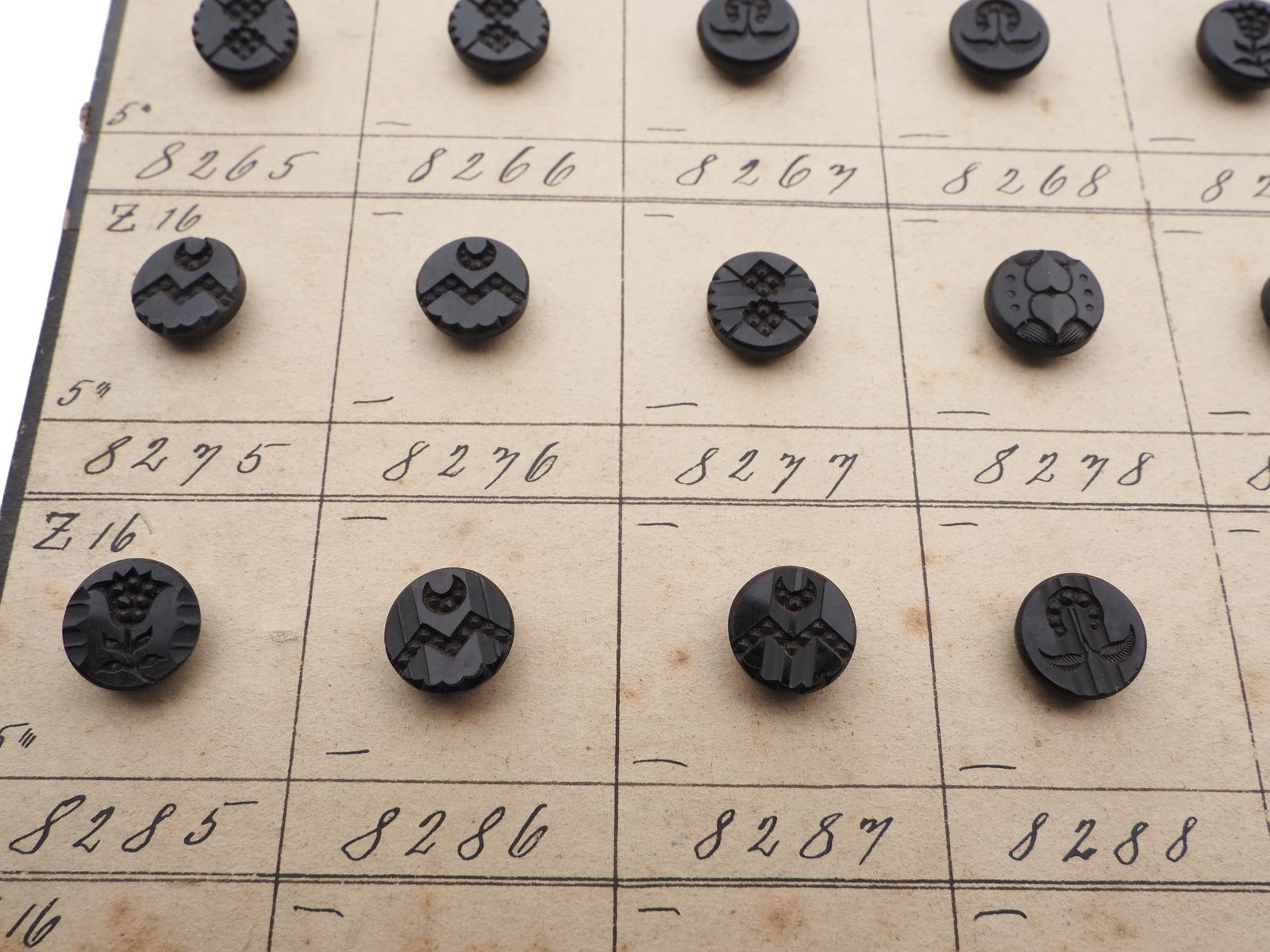 Sample card (140) Czech antique black carved dimi glass buttons 