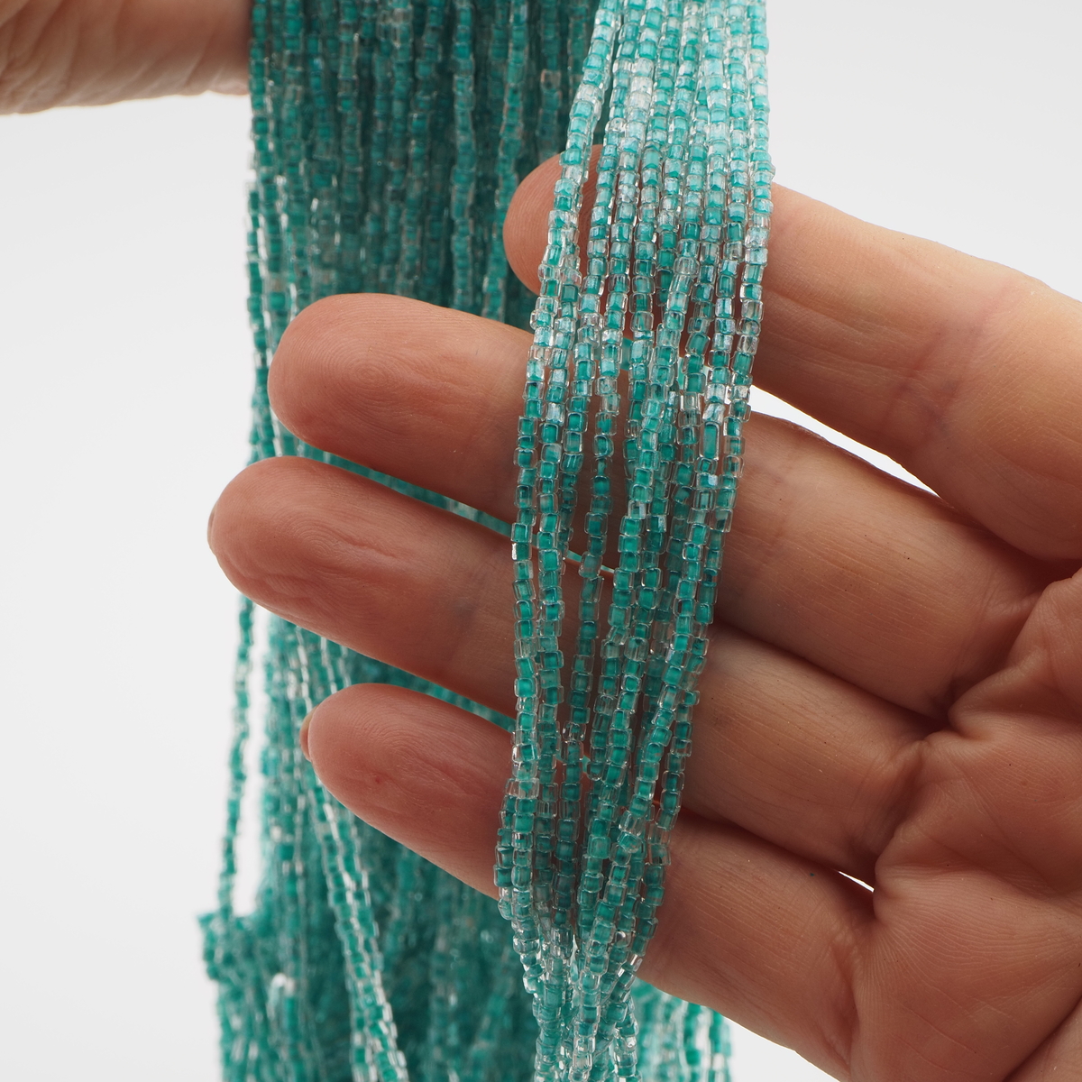 Master Hank crystal green colored seed glass beads 15/0 Vintage Czech - kopie