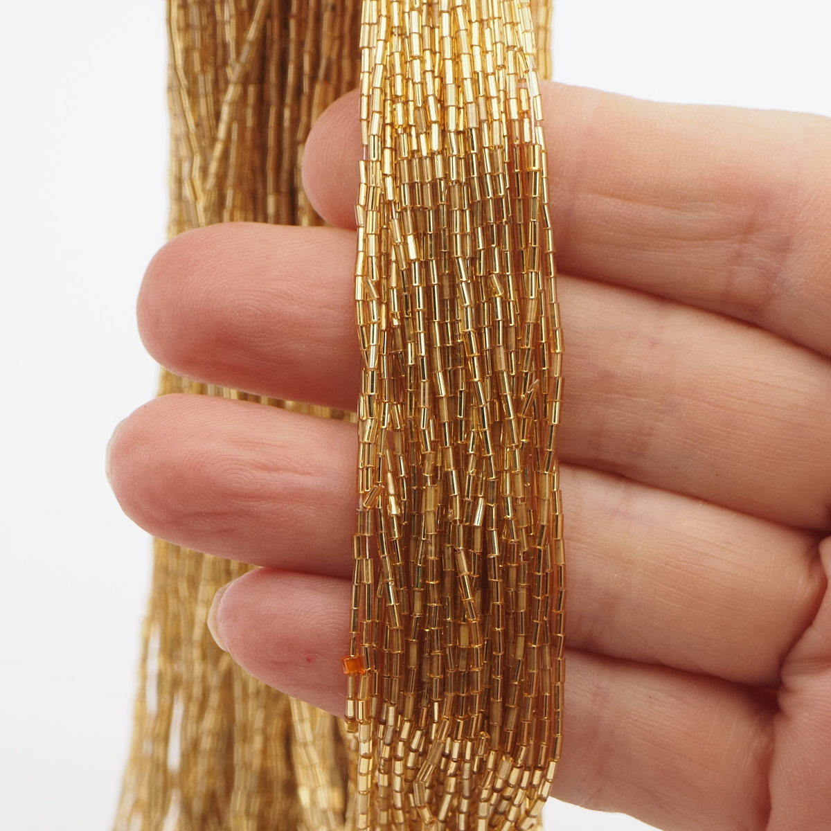 Master Hank gold lined bugle seed glass beads 12/0 Vintage Czech