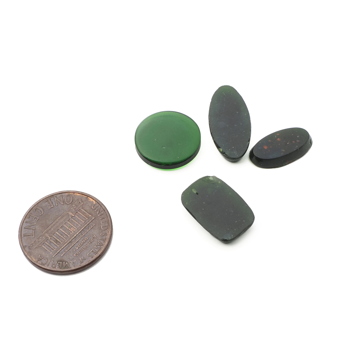 Lot (4) Czech vintage green marble lozenge glass cabochons