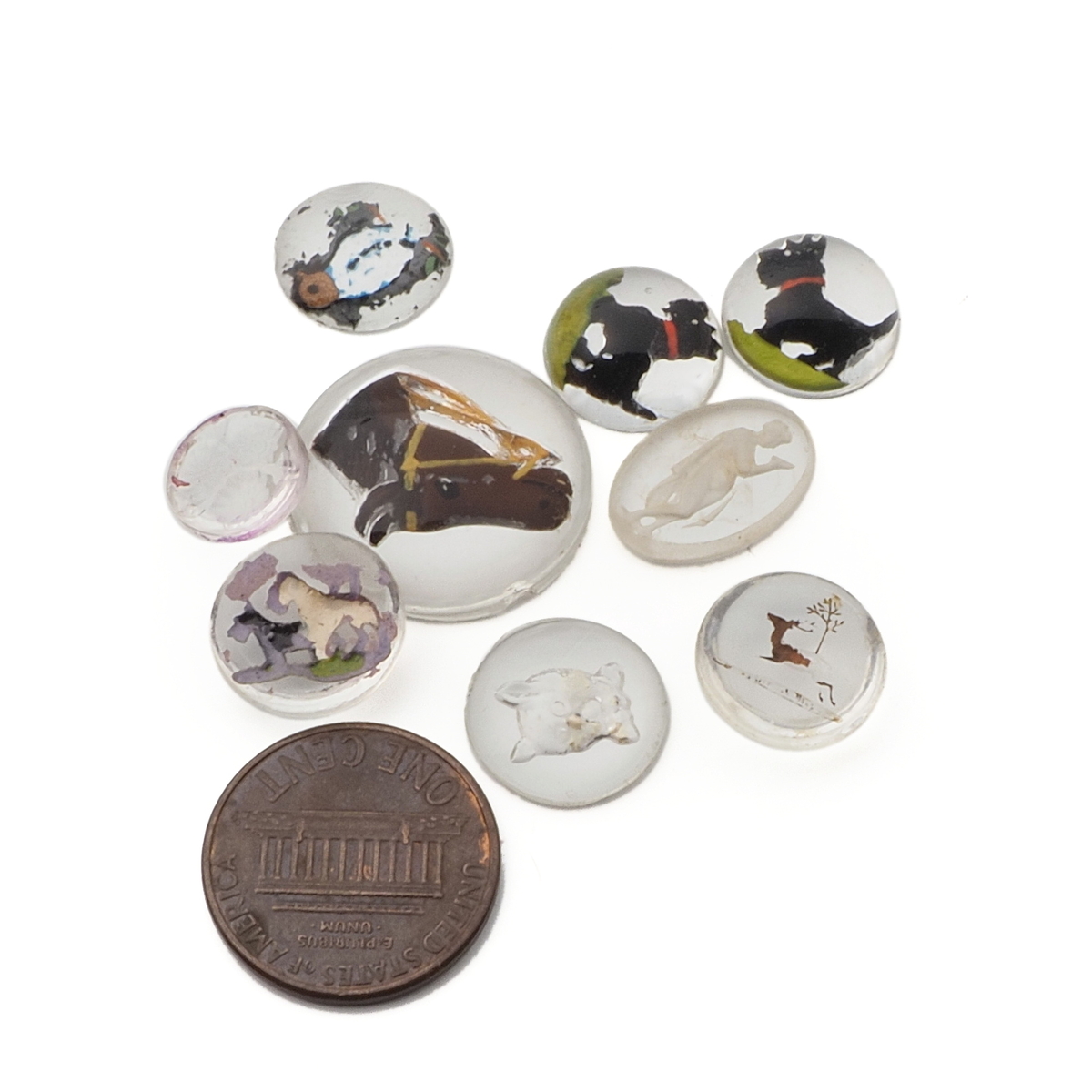 Lot (9) rare Czech antique intaglio figural glass cabochons