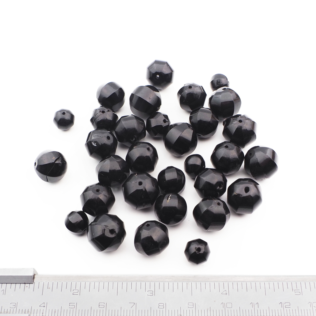Lot (31) Czech antique round melon faceted black glass beads