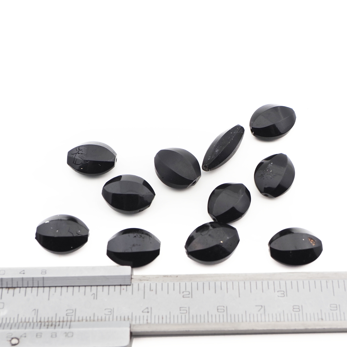 Lot (11) Czech antique oval faceted black glass beads